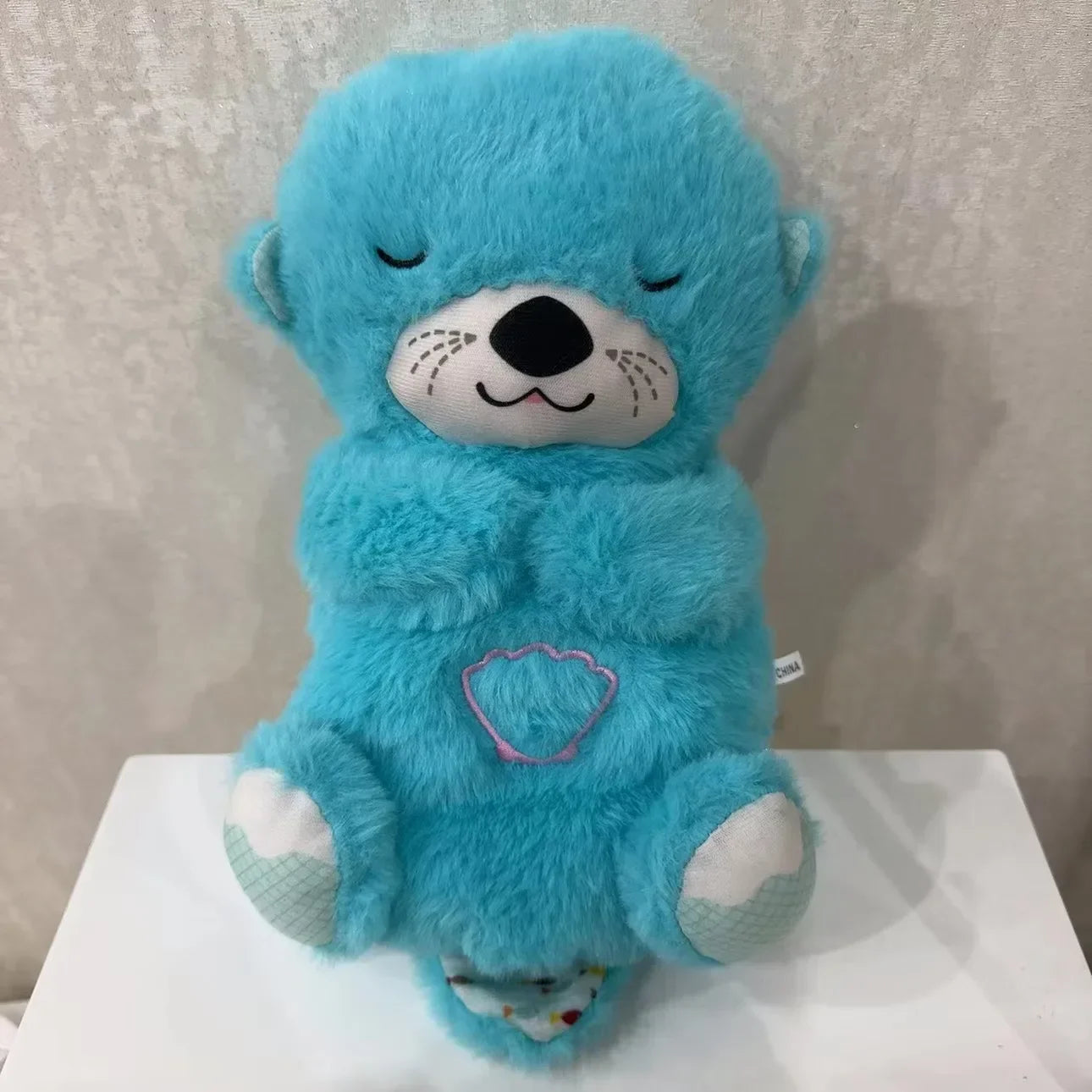 Muñeco con luz osito capibara